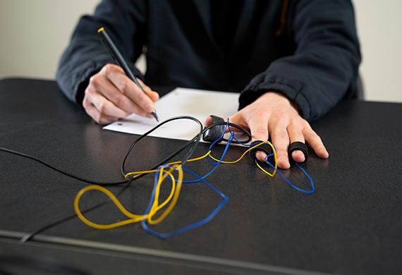 Image of a psychology student using neurological equipment