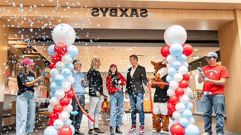 Image of Saxby's ribbon-cutting at grand opening event.