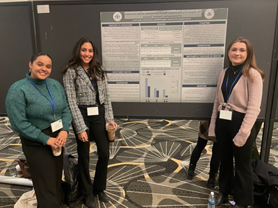 Image of student and faculty member presenting research at the Eastern Psychological Association.